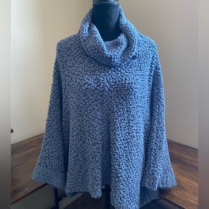 Super cute with jeans and boots! A medium oversized sweater. Super Comfortable!